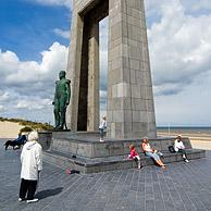 Tourists at the statue of Leopold I at the Esplanade, De Panne, Belgium